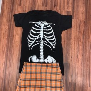 Skeleton shirt with plaid skirt